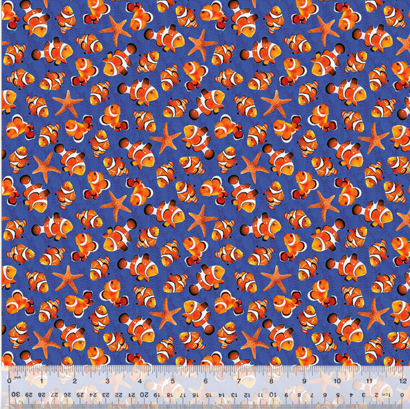 Tela de Algodón Pez Payaso Y Estrellas